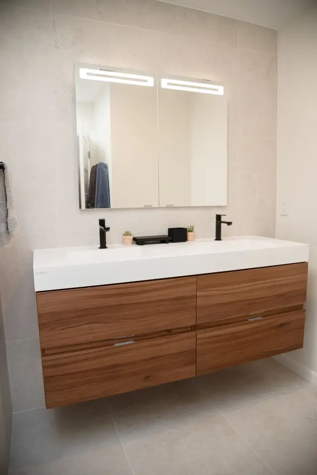 Floating walnut double vanity