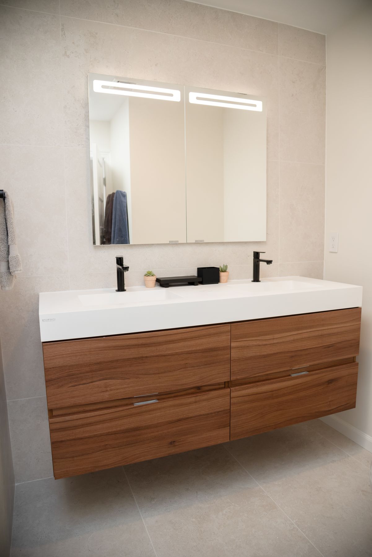 Floating walnut double vanity