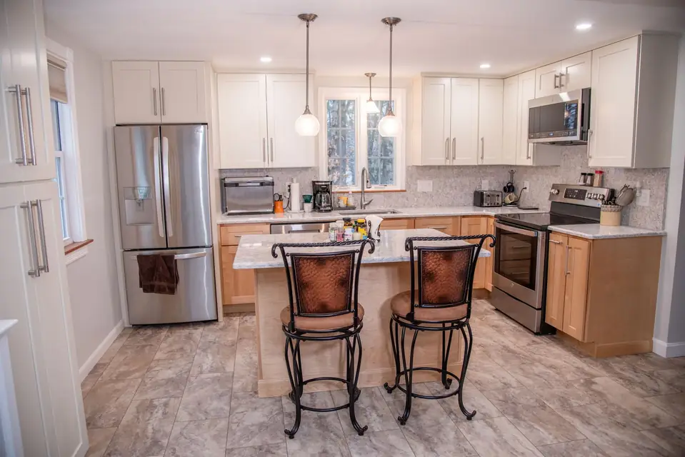 Full kitchen remodel with maple cabinets and an island