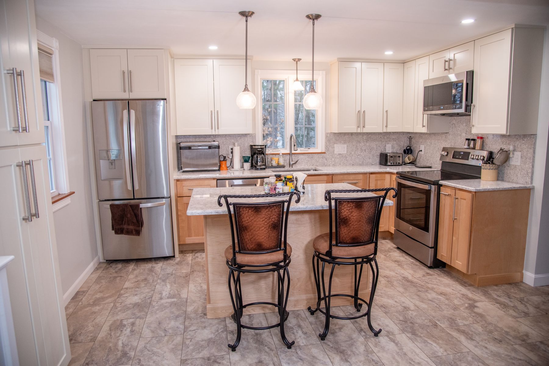 Full kitchen remodel with maple cabinets and an island