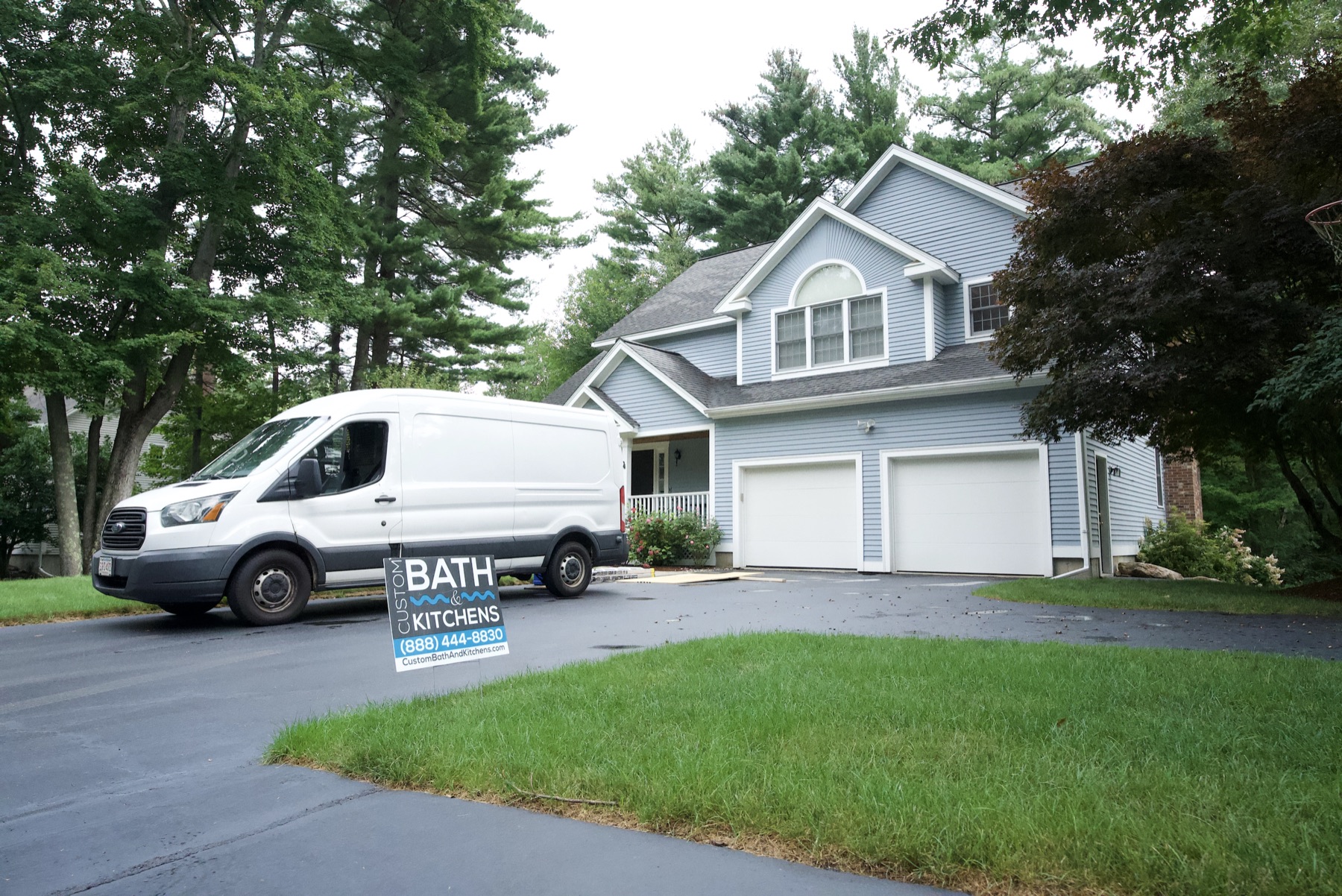 A Bath & Kitchens van on a house call